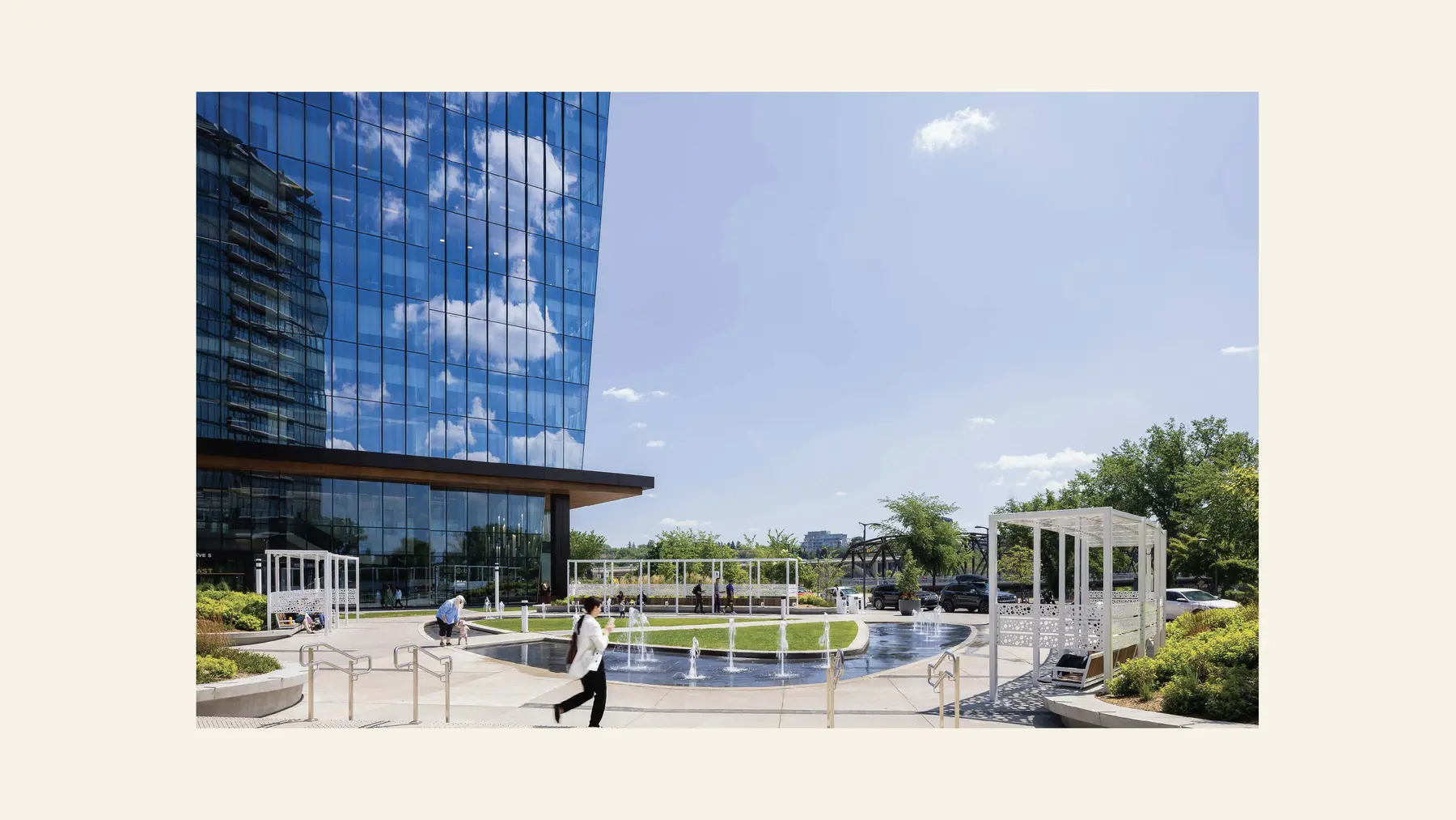 Built view of the plaza trellis and water feature