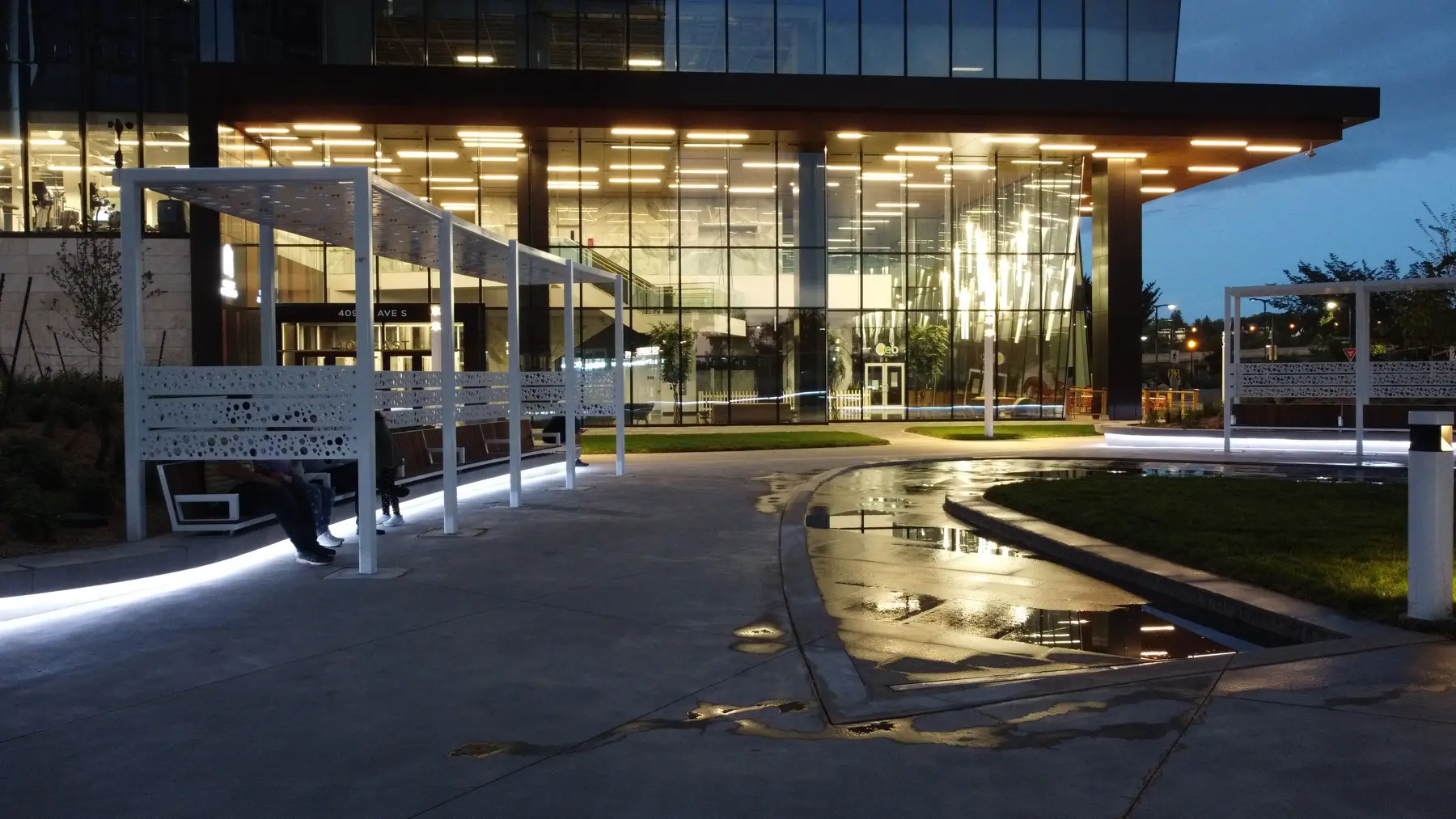 Evening view of the pavilion and reflective water feature